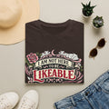 T‑Shirt — “I Am Not Here to Be Likeable” Gothic Rose Graphic Tee